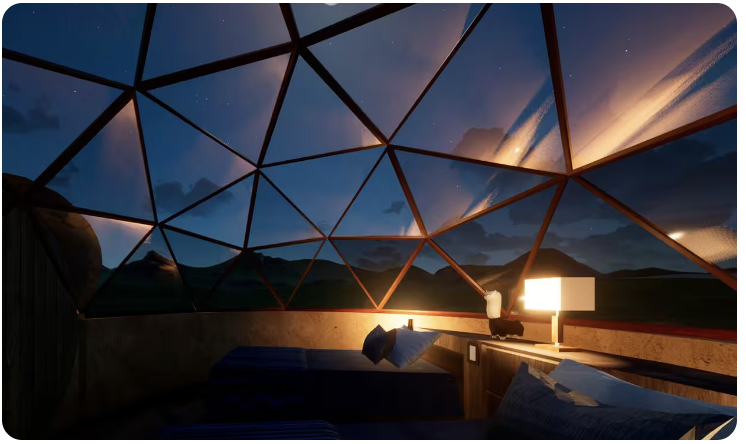 Interior of geodesic glass dome at twilight with mountain views